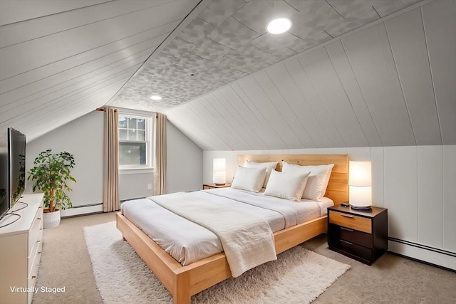 carpeted bedroom with vaulted ceiling and baseboard heating