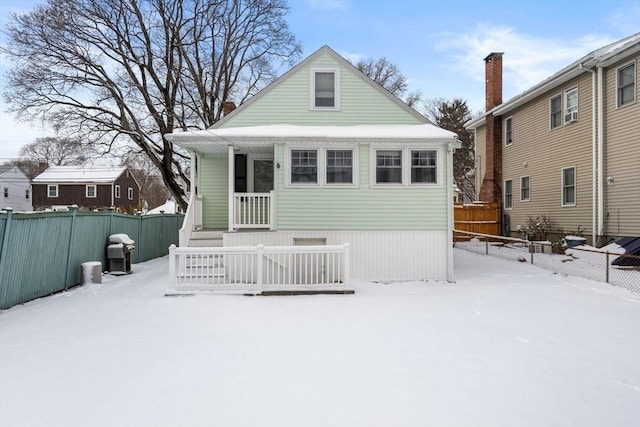 view of snow covered property