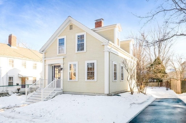 view of snow covered property