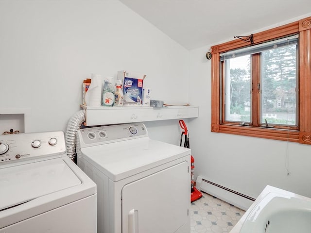 laundry area with a baseboard heating unit and washing machine and clothes dryer