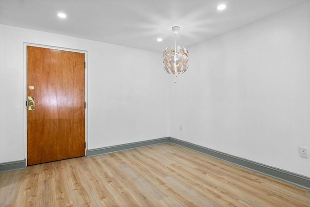 84 Grant St Unit 7, Somerville, MA 02145 - unfurnished room with a chandelier, recessed lighting, and wood finished floors