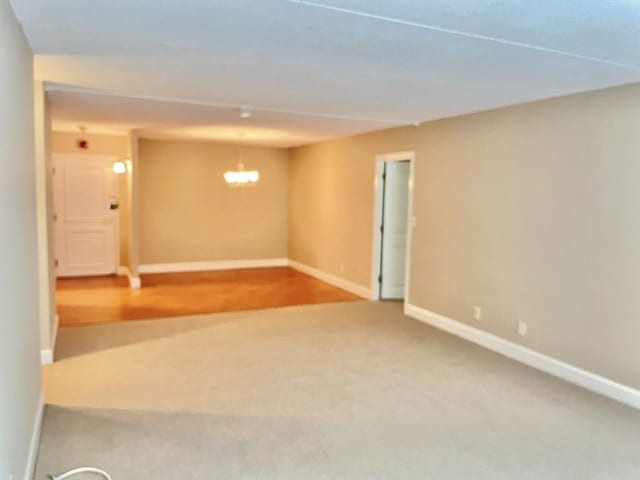 1500 Worcester Rd Unit 631, Framingham, MA 01702 - carpeted spare room with baseboards