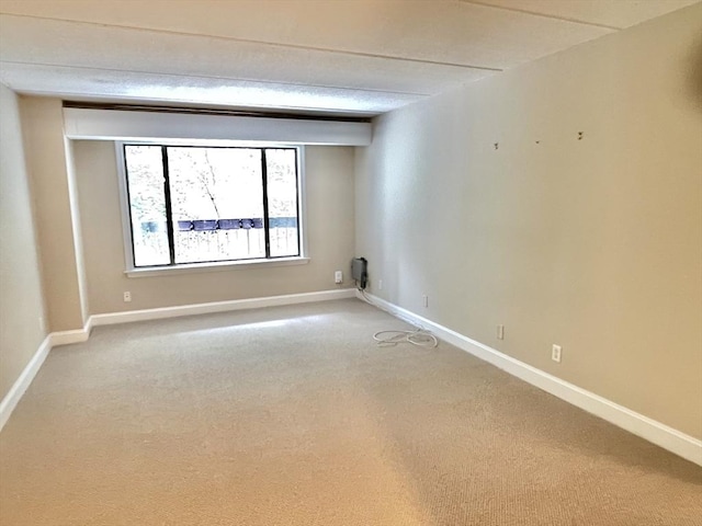 1500 Worcester Rd Unit 631, Framingham, MA 01702 - spare room featuring light colored carpet and baseboards