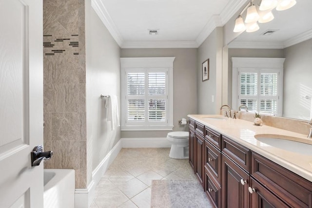 bathroom with a sink, toilet, and crown molding