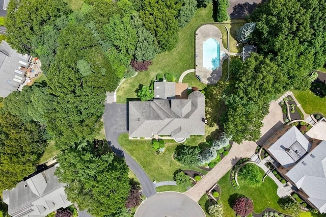 birds eye view of property with a residential view