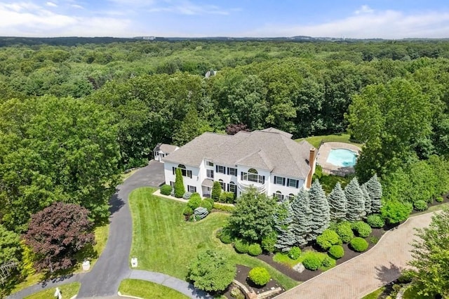 bird's eye view featuring a view of trees