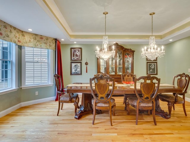 14 Nassau Dr, Winchester, MA 01890 - dining room with a chandelier, a wealth of natural light, ornamental molding, and a raised ceiling