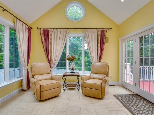 14 Nassau Dr, Winchester, MA 01890 - sitting room with light tile patterned flooring, baseboards, and vaulted ceiling