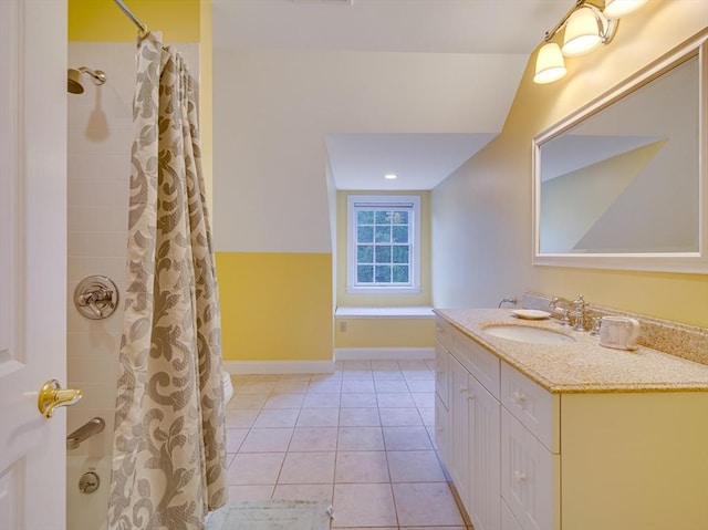 14 Nassau Dr, Winchester, MA 01890 - bathroom with tile patterned floors, shower / tub combo with curtain, vanity, and baseboards