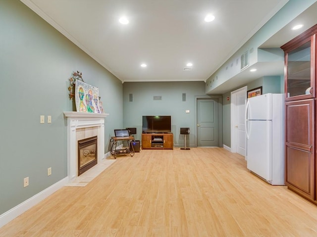 14 Nassau Dr, Winchester, MA 01890 - living area featuring ornamental molding, visible vents, baseboards, and a fireplace