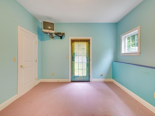 14 Nassau Dr, Winchester, MA 01890 - unfurnished room featuring tile patterned floors and baseboards