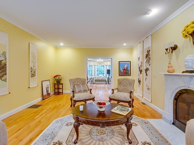 14 Nassau Dr, Winchester, MA 01890 - sitting room with light wood finished floors, baseboards, and ornamental molding