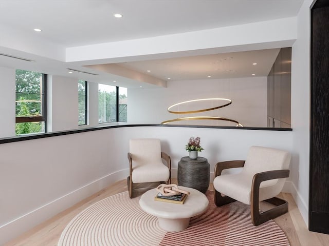 sitting room with light wood-type flooring