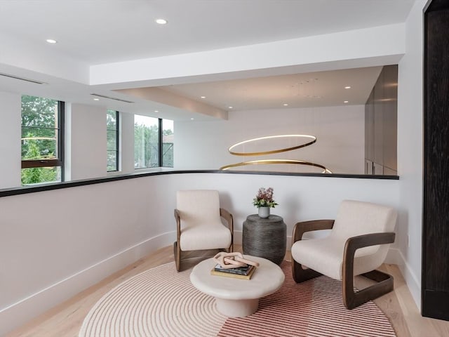 living area featuring light hardwood / wood-style floors