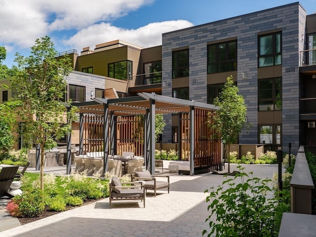 view of property's community with a patio