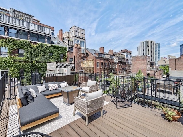 deck featuring an outdoor living space