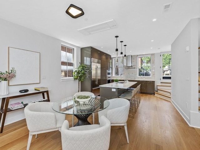 living room with light hardwood / wood-style flooring