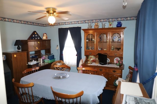 dining area with ceiling fan