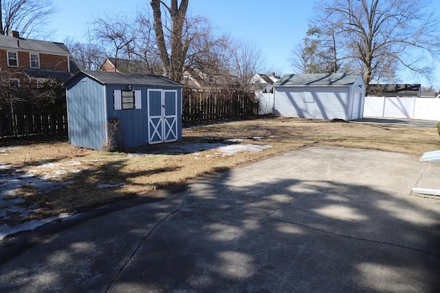 view of shed with a fenced backyard