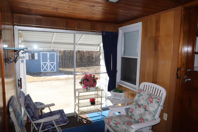 sunroom / solarium featuring wooden ceiling