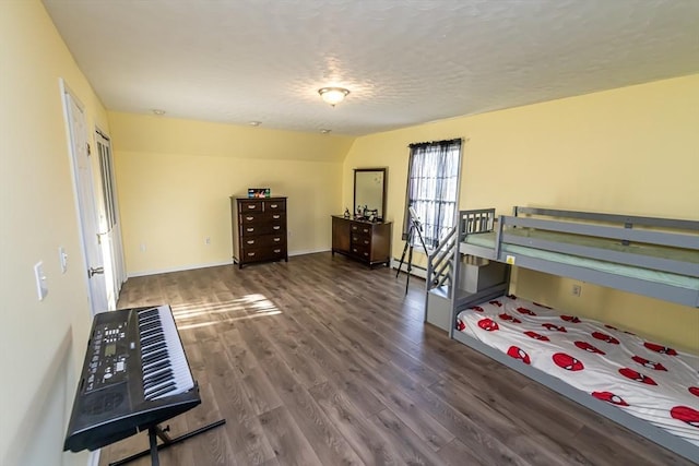 bedroom featuring dark wood-type flooring