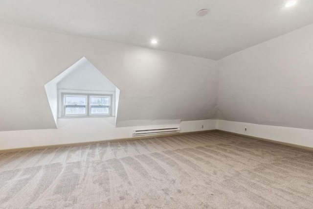 bonus room with recessed lighting, lofted ceiling, baseboard heating, and carpet