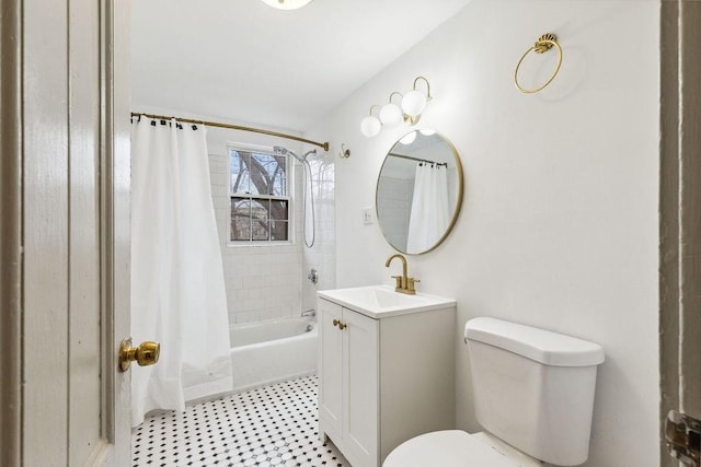 full bathroom featuring toilet, vanity, and shower / bath combo