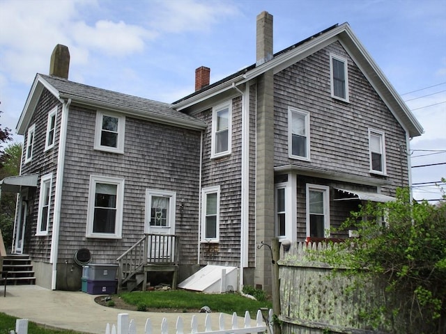 360 Russells Mills Rd, Dartmouth, MA 02748 - back of property featuring a chimney