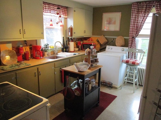 360 Russells Mills Rd, Dartmouth, MA 02748 - laundry room featuring washer / dryer, radiator heating unit, and light floors