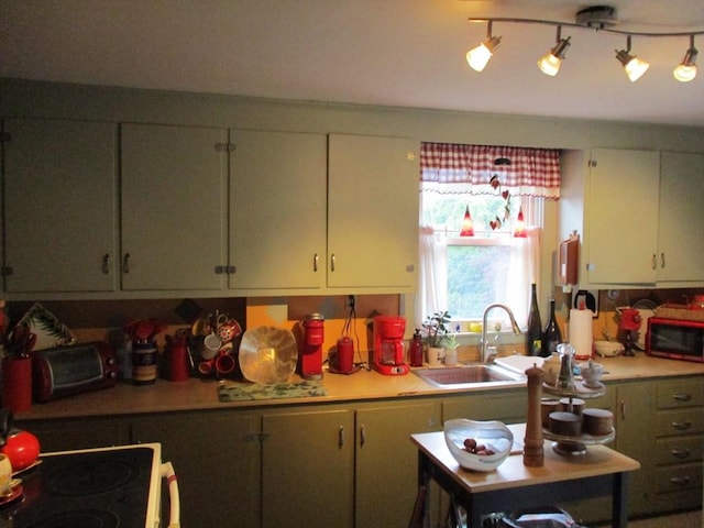 360 Russells Mills Rd, Dartmouth, MA 02748 - kitchen with stainless steel microwave, light countertops, a sink, and stove