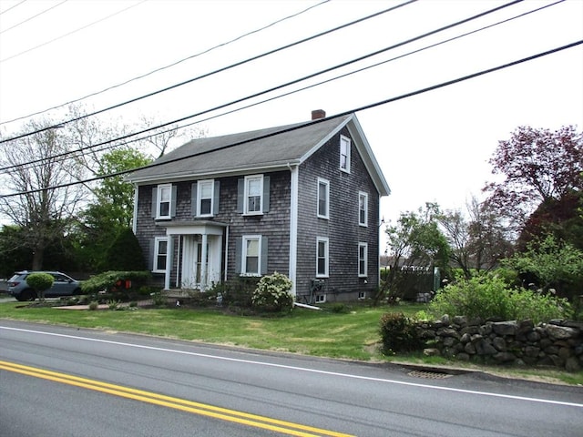 360 Russells Mills Rd, Dartmouth, MA 02748 - colonial home featuring a front lawn and roof with shingles