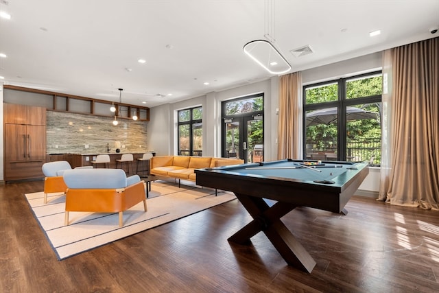 game room with french doors, dark hardwood / wood-style floors, and pool table