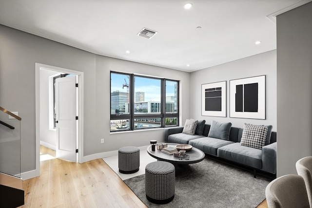 living room with light hardwood / wood-style flooring