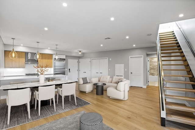 dining room featuring light hardwood / wood-style flooring