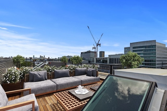 wooden deck featuring outdoor lounge area