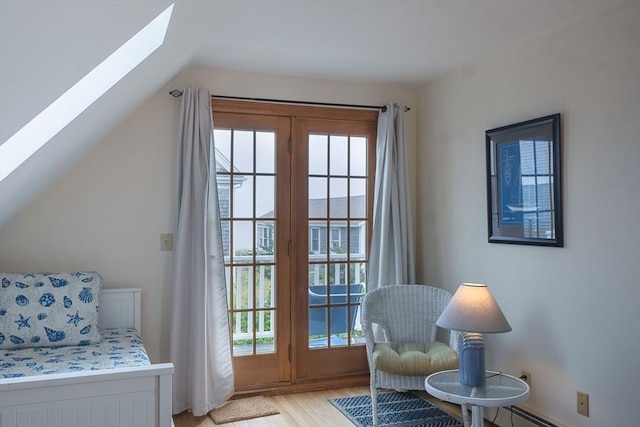 99 N Shore Blvd Unit 1, Sandwich, MA 02537 - living area featuring a skylight, light wood-type flooring, and lofted ceiling