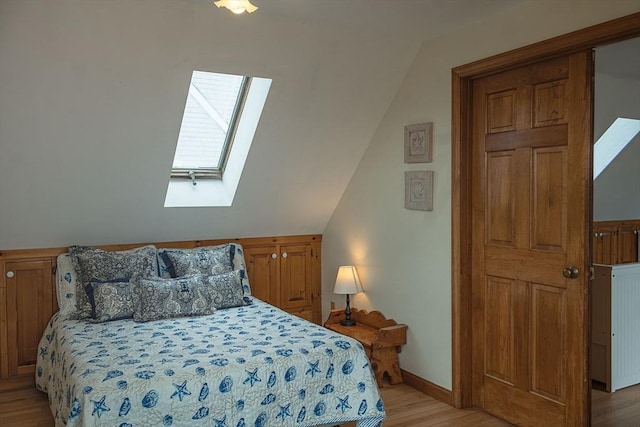 99 N Shore Blvd Unit 1, Sandwich, MA 02537 - bedroom featuring a skylight, light wood finished floors, and lofted ceiling