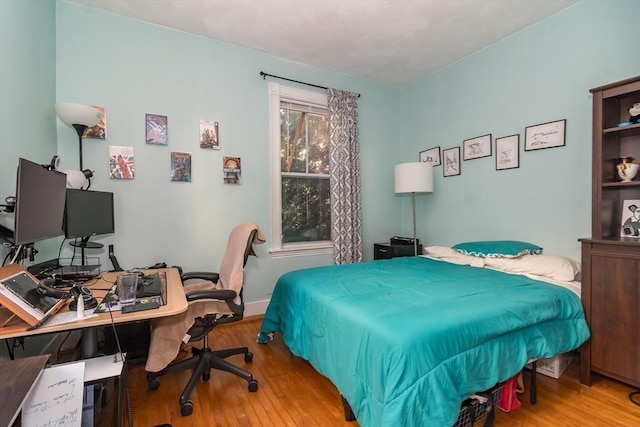 bedroom featuring light hardwood / wood-style floors