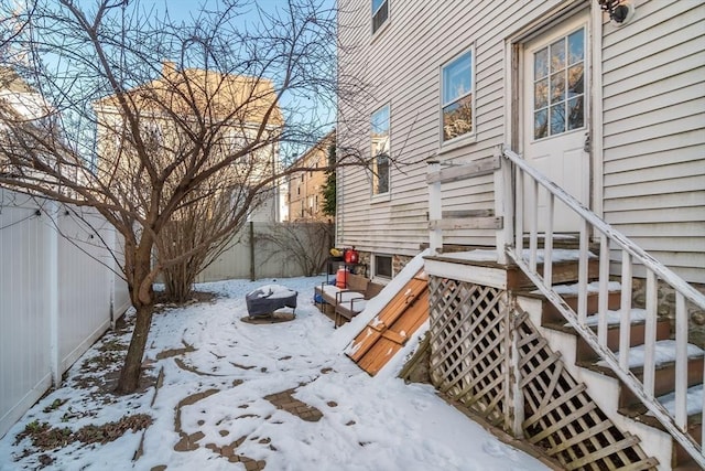 view of yard layered in snow