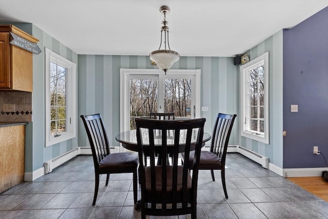 33 Gulf Hill Dr, Dartmouth, MA 02748 - dining space featuring wallpapered walls, baseboards, baseboard heating, and dark tile patterned flooring