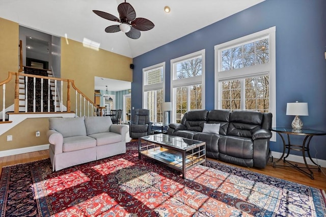 33 Gulf Hill Dr, Dartmouth, MA 02748 - living room with stairway, a ceiling fan, baseboards, and wood finished floors