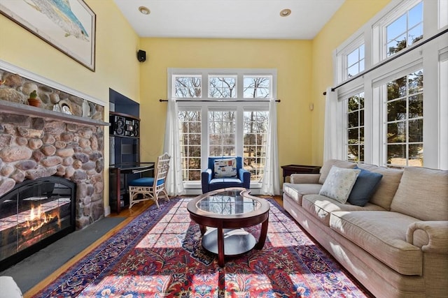 33 Gulf Hill Dr, Dartmouth, MA 02748 - living area featuring a fireplace, wood finished floors, and a high ceiling
