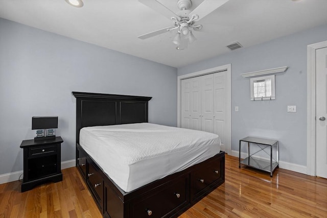33 Gulf Hill Dr, Dartmouth, MA 02748 - bedroom with light wood-style flooring, baseboards, and a closet