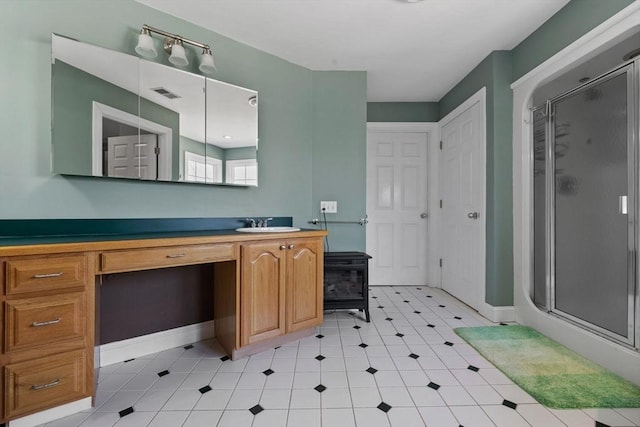 33 Gulf Hill Dr, Dartmouth, MA 02748 - bathroom with baseboards, visible vents, vanity, and a stall shower