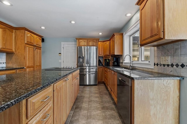 33 Gulf Hill Dr, Dartmouth, MA 02748 - kitchen with backsplash, dark stone countertops, stainless steel appliances, and a sink