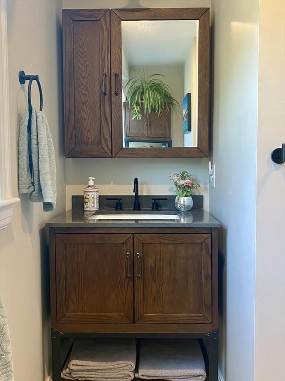 551 Indian Head St, Hanson, MA 02341 - bar area with a sink and baseboards