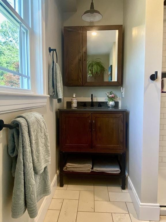 551 Indian Head St, Hanson, MA 02341 - bathroom featuring vanity and a shower