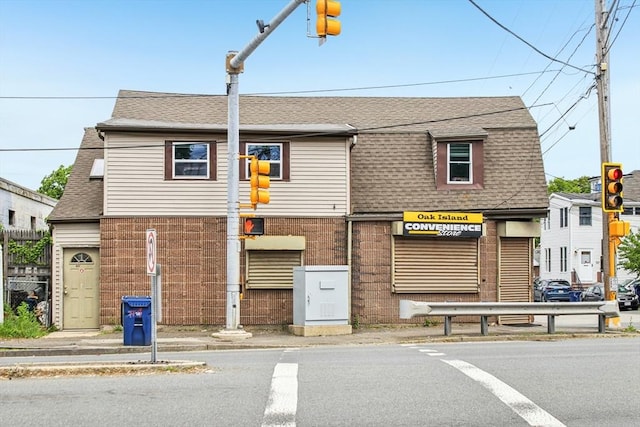 831 N Shore Rd, Revere, MA 02151 - view of front of home with a shingled roof