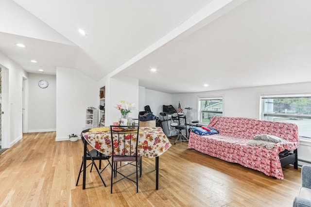 831 N Shore Rd, Revere, MA 02151 - dining area with light wood finished floors, recessed lighting, and lofted ceiling