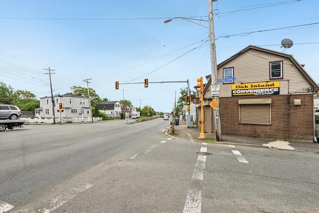 831 N Shore Rd, Revere, MA 02151 - view of asphalt road with traffic lights, traffic signs, street lights, and curbs